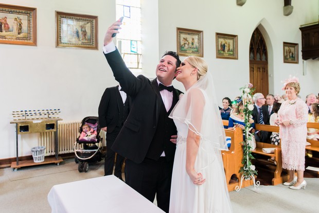 21-Modern-church-wedding-ireland-relaxed-photography-selfie-altar-weddingsonline